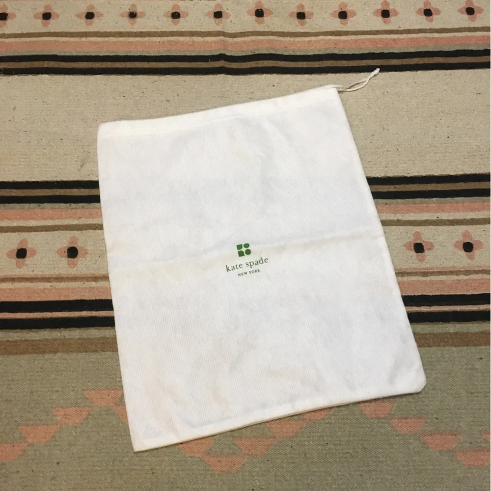 Kate Spade White drawstring dustbag logo on front